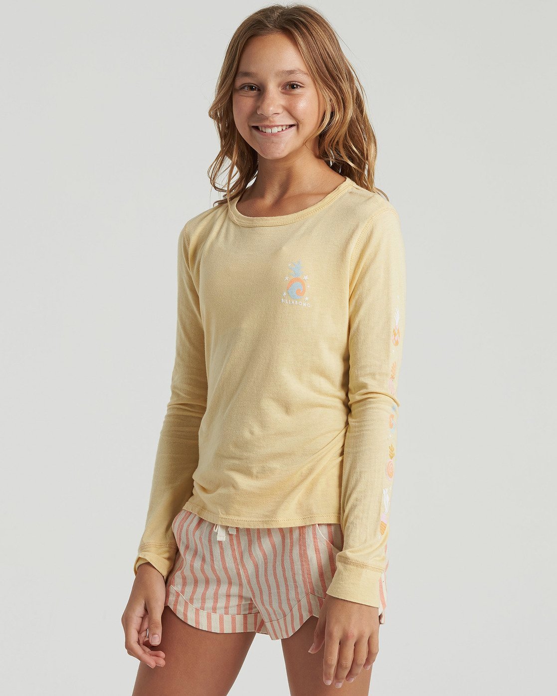 pale yellow long sleeve shirt