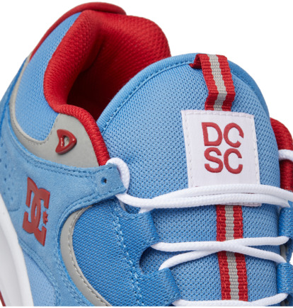 Red and store white dc shoes