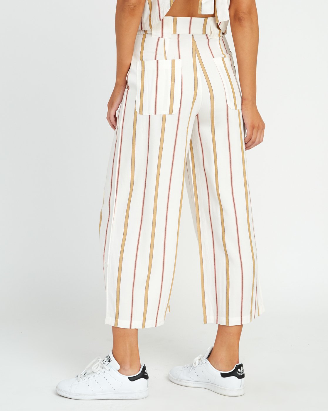 beige striped trousers