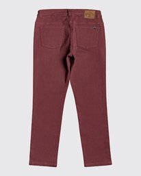 Jean slim homme rouge sale