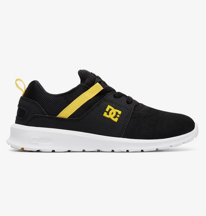 black and yellow dc shoes