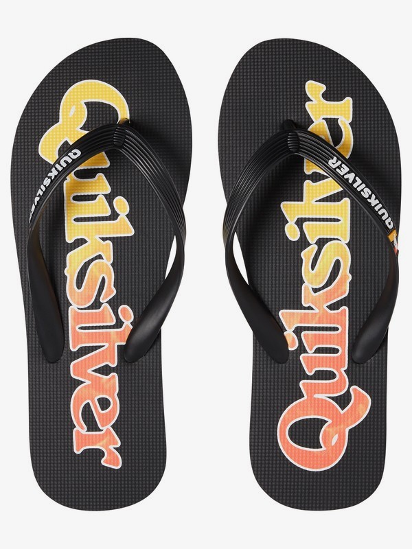 white quiksilver flip flops